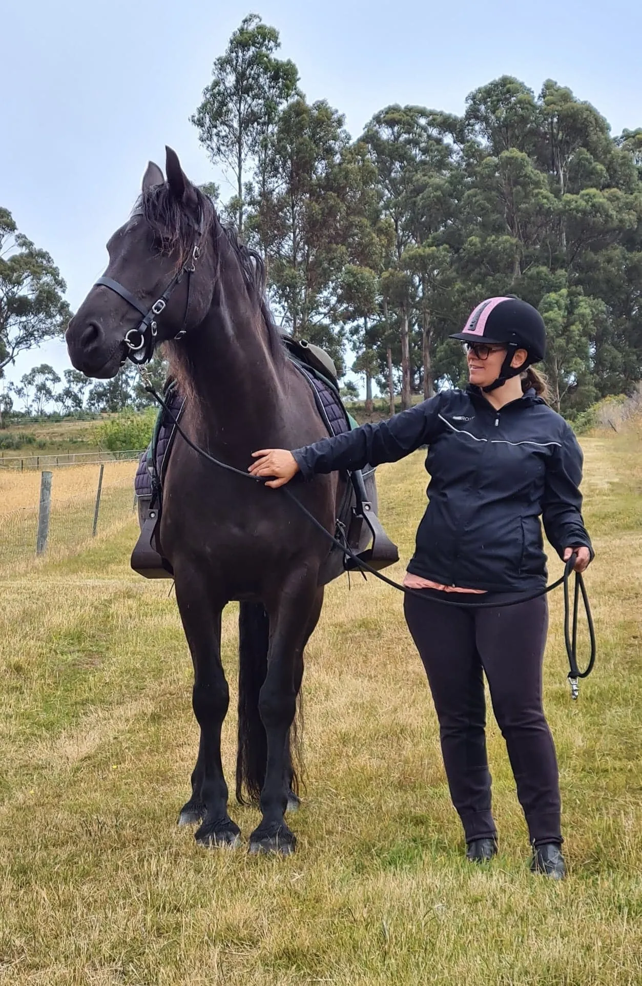 The Innovative Equestrian Bridle is designed to lead your horse in many different situations I find the Innovative Equestrian Bridle handy when I have my children's friends, who are not horsy, come over to visit for a pony ride. That's because I can just clip the lead rope straight onto the halter clip when leading them around. They are inexperienced riders and it is unsafe for them to ride alone. I like to give them access to the reins. This helps them in learning how to ride safely. I used to have a halter under the bridle before I invented the Innovative Equestrian Bridle. The problem with that was that it was bulky and looked messy. I noticed that my horse would shake his head when he had the halter under his old bridle. The other great benefit of the Innovative Equestrian Bridle is I can lead a young horse straight from the halter clip while riding my other horse. This way, I can teach the young horse to carry his Pee Wee horse bit while being led from my other horse. This can help with mouthing the young horse. Last, of all, the bridle is great for leading your horse on the trails, especially down steep hills. Our Australian rope reins double as a great lead rope when I clip them on the halter ring of the Innovative Equestrian Bridle.